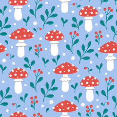 Seamless pattern of mushrooms, berries, and flowers on a blue background. Vector graphics