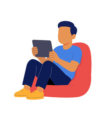 Boy Relaxing on Bean Bag Using Tablet &ndash; E-Learning & Digital Leisure