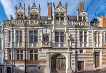 Blois, France - 10 27 2025: Detail view of the Hotel d'Alluye facade and the sculpted bases of small grotesque figures