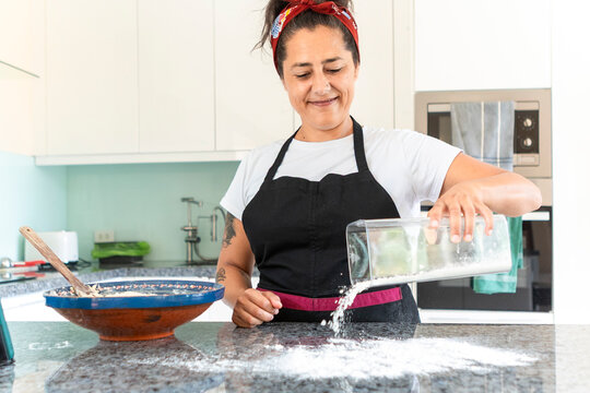 Woman making homemade bread in the kitchen