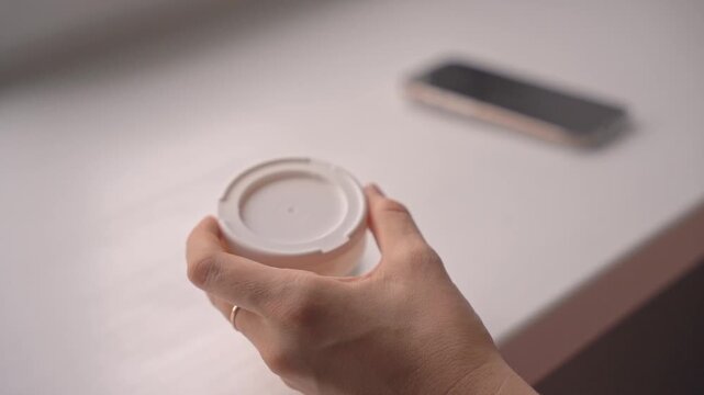 Returning used nicotine pouch to lid compartment after use. High quality 4k footage