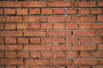 古くて荒い、赤レンガの壁の背景テクスチャ。日陰＆クローズアップバージョン