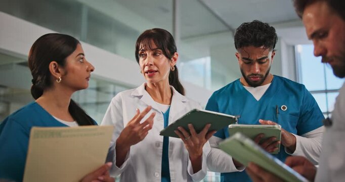 Doctor, tablet and group discussion in hospital for shift handover, task delegation or schedule. Nurse, people or meeting with digital app for clinic management, healthcare update or surgery feedback