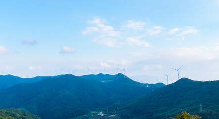 Wind turbines on Baiyan mountain during autumn season at Hengxi county, Yinzhou District, Ningbo city, Zhejiang province, China