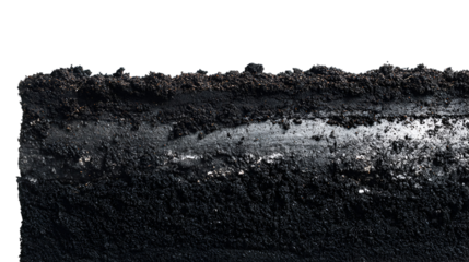 Close up of a dark textured surface with a light colored anomaly