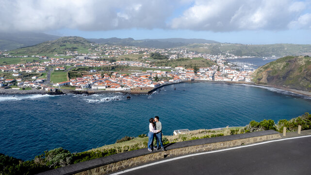 Couple kissing with view of Horta from Monte da Guia