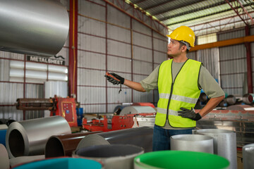 Industry inspection warehouse professional worker industrial setting focused view safety protocols in action