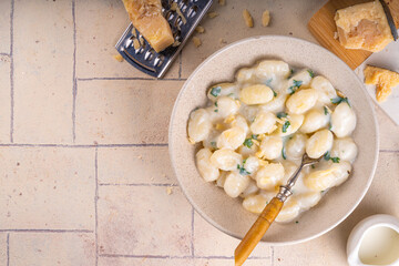 Gnocchi with white creamy sauce