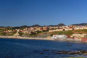 Urban view of El Pricipe with vibrant houses by the sea