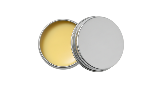 Open metal tin with yellow balm and closed lid container