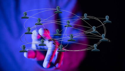Abstract image of a hand interacting with a network of people, representing connection,...