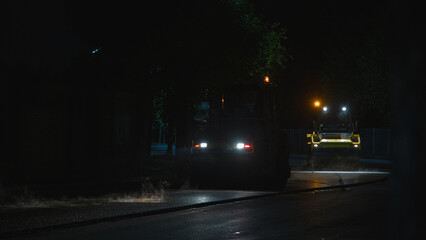 Silent evening scene with maintenance and reflective streaks