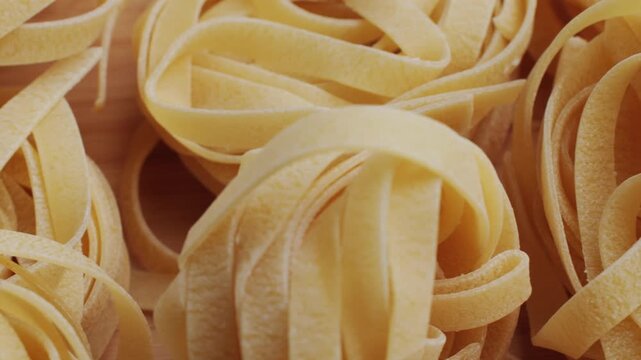 Italian tagliatelle pasta packaging window, Fettuccine pasta, close up, not cooked