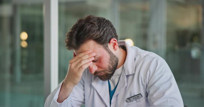 Man, doctor or headache with stress for pressure, overworked or mental health in hospital. Frustrated, male person or healthcare surgeon with anxiety, fatigue or migraine for burnout, fail or mistake