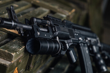focus on gun barrel and grip details, magnified shot highlighting firearm parts and finishes
