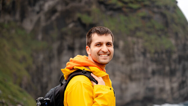 Man exploring Morro de Castelo Branco in Azores