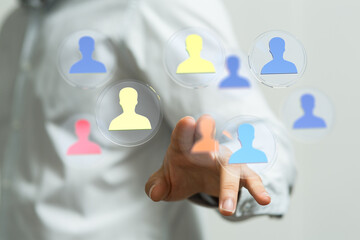 Hand interacting with digital interface showing concept of teamwork, networking, business, connections, and collaboration. Perfect for presentat