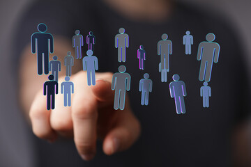 Concept of a digital human network. Hand pointing to people icons, symbolizing connection, networking, and online communities.