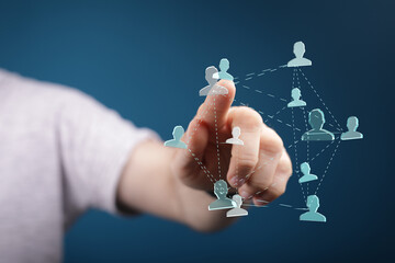 Abstract illustration of a digital network with a hand touching the network. Concept of connection, communication, and social interaction.