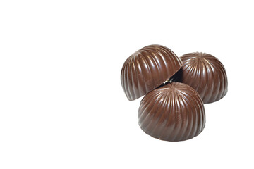 Sweet confectionery. Chocolate candies with filling on a PNG background.