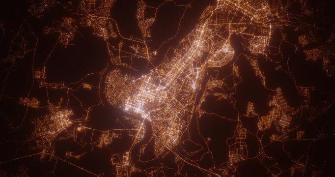 Ufa (Russia) aerial view at night. Top view on city from space. Camera is zooming in, rotating clockwise