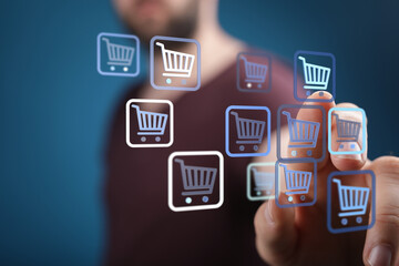 Person interacting with virtual shopping cart symbols, representing e-commerce and online purchasing. Modern technology, convenience, and digita