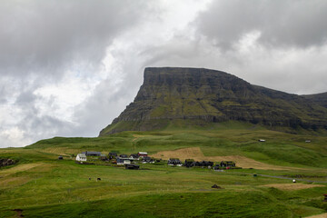 The village of Gásadalur, located near Múlafossur waterfall on Vágar Island in the Faroe Islands, known for its picturesque landscapes.