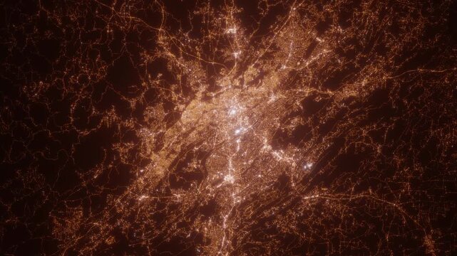 Birmingham (Alabama, USA) aerial view at night. Top view on city from space. Camera is zooming in, rotating clockwise
