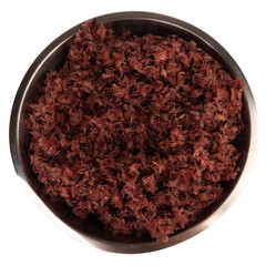 Black sticky rice is in the stainless steel bowl on white background