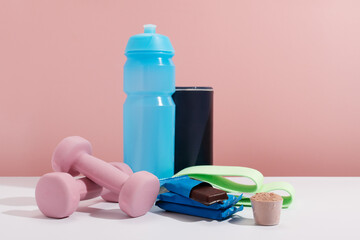 Fitness essentials including protein bars and equipment