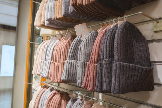 Display of colorful knitted hats in a clothing store