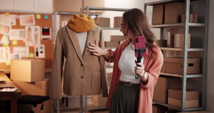 Woman, fashion and logistics with phone for vlog, online advertising or showcase in small business. Female person, boutique or clothing designer with mobile smartphone for ecommerce or marketing