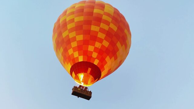 Beautiful colorful hot air balloon hd video flying in blue clear sky bottom view over amazing valleys in Pamukkale Turkey high resolution high quality 4k perfect for campaigns