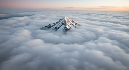 The way clouds wrap around a mountain peak.