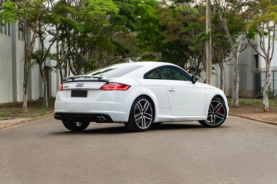 White Audi TTS Rear Quarter View , Sport Coupe on Tree Lined Road