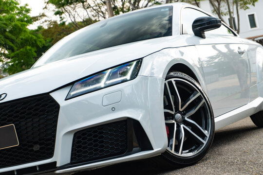White Audi TTS Front View , Sport Coupe Exterior with Trees Background
