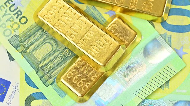 video of 100 euro bills with gold bars