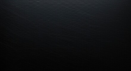 A close-up shot revealing the rough, matte finish and deep charcoal coloring of a thick industrial black steel plate ,construction ,sheet ,metallic