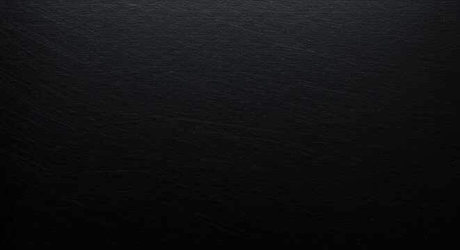 A close-up shot revealing the rough, matte finish and deep charcoal coloring of a thick industrial black steel plate ,construction ,sheet ,metallic