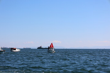 Boats gathered around the Florya Atat&uuml;rk Mansion are celebrating October 29 Republic Day with Turkish flags.