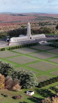 vue a&eacute;rienne panoramique de l'ossuaire de Douaumont en automne, ciel bleu tr&egrave;s nuageux