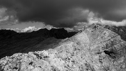 peak of Bonegg or Poneck with clouds, Steinernes Meer mountain range, monochrome, Salzburger Land, Austria