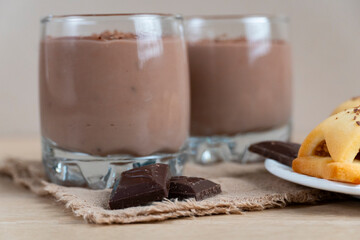 Homemade cookies with chocolate pudding and grated dark chocolate