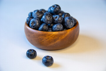 Fresh Blueberries in Wooden Bowl