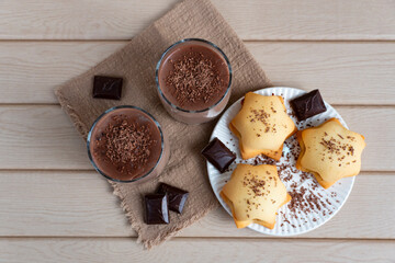 Homemade cookies with chocolate pudding and grated dark chocolate