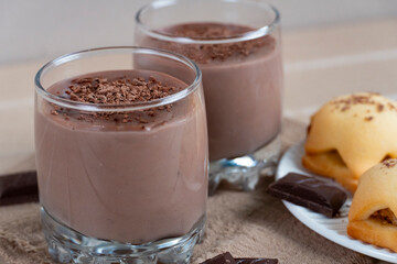 Homemade cookies with chocolate pudding and grated dark chocolate
