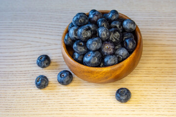 Fresh Blueberries in Wooden Bowl