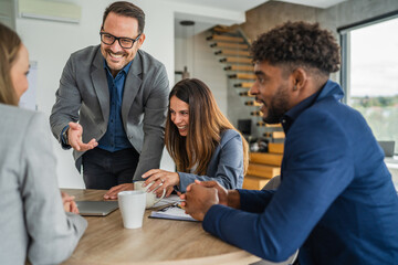 Diverse business team collaborating during a corporate meeting