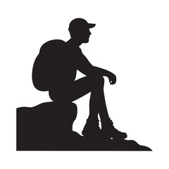 Silhouette of backpacker resting.