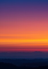 Obraz premium Smooth and vibrant natural color transition featuring the warm hues of a dramatic twilight sky, blending orange, pink, and deep indigo ,transition ,tranquil ,wallpaper